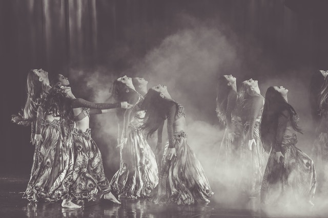 Group performing belly dance choreography at oriental hen party dance class Glasgow